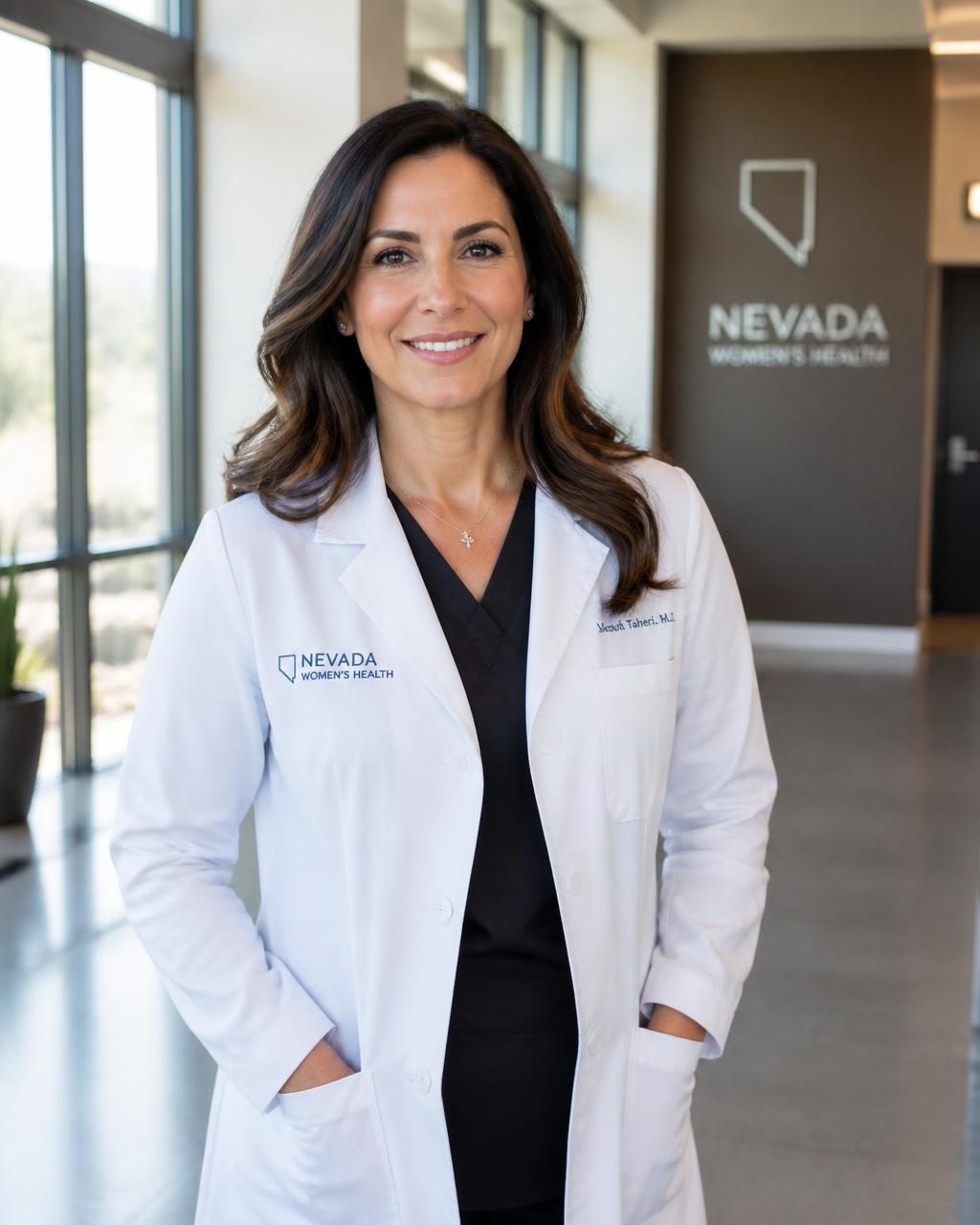 Nevada physician standing in a modern clinic hallway